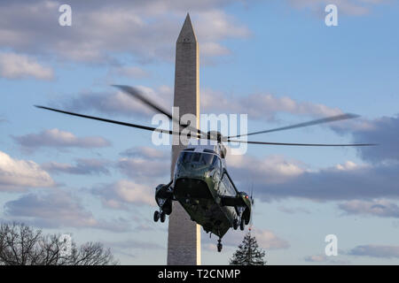 Washington, District of Columbia, USA. 31st Mar, 2019. Marine One lands on the South Lawn in Washington, DC, U.S., on Sunday, March 31, 2019. United States President Donald J. Trump declared he is likely to shut down America's southern border this week unless Mexican authorities immediately halt all illegal immigration Credit: Tasos Katopodis/CNP/ZUMA Wire/Alamy Live News Stock Photo