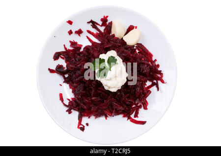 Grated beets in a plate isolated on white background Stock Photo