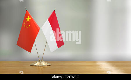 Flags pair on a desk over defocused background Stock Photo