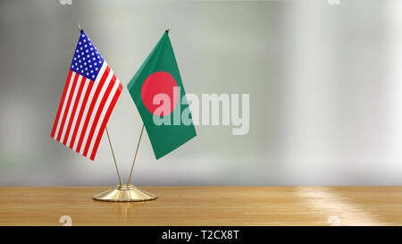 Flags pair on a desk over defocused background Stock Photo