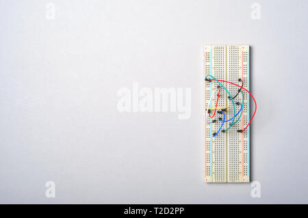 Breadboard and Electronic Wires, Prototyping Board for Electronic Projects Stock Photo