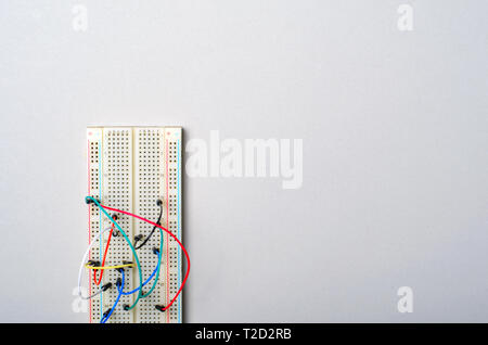 Breadboard and Electronic Wires, Prototyping Board for Electronic Projects Stock Photo