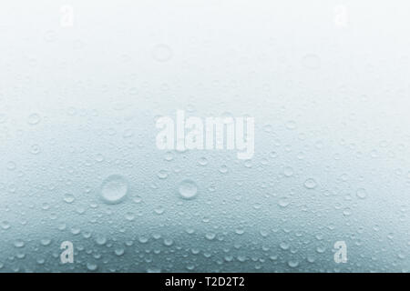 Rain droplets on glass background, Water drops on white background , texture . Stock Photo