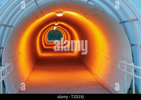 tunnel under the highway, illuminated underpass Stock Photo