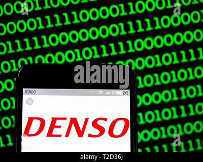 In this photo illustration a Denso Corporation logo seen displayed on a smart phone Stock Photo