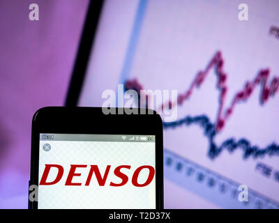 In this photo illustration a Denso Corporation logo seen displayed on a smart phone Stock Photo