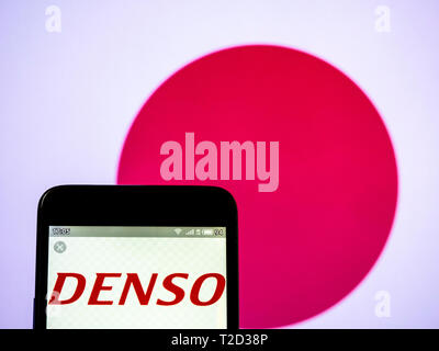 In this photo illustration a Denso Corporation logo seen displayed on a smart phone Stock Photo