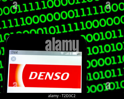 In this photo illustration a Denso Corporation logo seen displayed on a smart phone Stock Photo