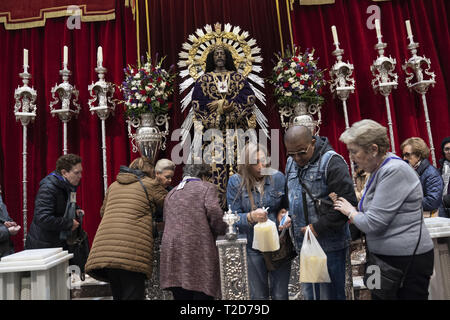 Thousands of Catholics from various countries gathered close to the 'Jess de Medinaceli' church in Madrid on the first Friday of March and Lent, to kiss the right foot of a 17th-century wooden image of Christ, known as Christ of Medinaceli. Pilgrims make three wishes to Jesus, of which he is said to grant one.  Featuring: Atmosphere Where: Madrid, Spain When: 01 Mar 2019 Credit: Oscar Gonzalez/WENN.com Stock Photo