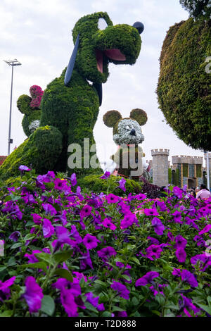 Pluto and Mickey Mouse figures made with flowers at the Miracle Garden, Dubai, United Arab Emirates Stock Photo