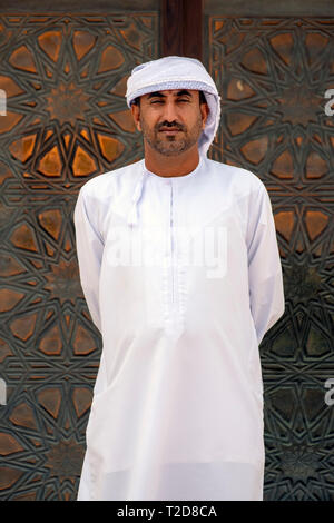 Arab man wearing traditional white clothing Stock Photo