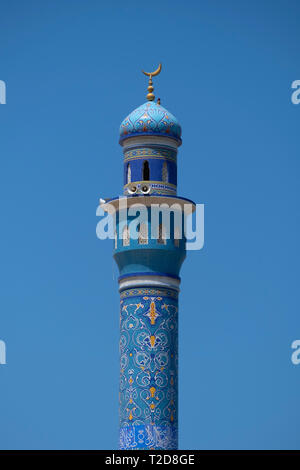 Blue minaret of the Masjid Al Rasool Al Adham mosque in Muscat, Oman Stock Photo