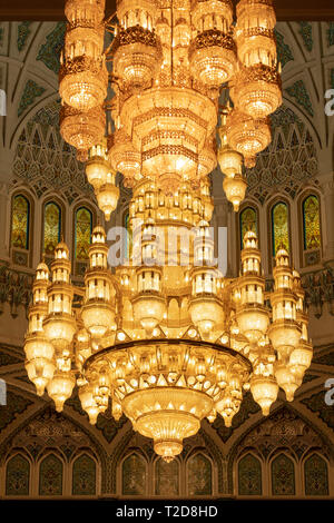 Swarovski crystal chandelier inside the main prayer hall of the Sultan Qaboos Grand Mosque in Muscat, Oman Stock Photo