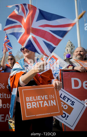 Pro-Brexit supporters gather with flags and placards for ‘Brexit Day’ protest in Westminster demanding Britain leaves the EU without further delay. Stock Photo