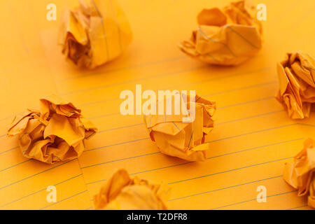 Concept Orange crumpled sheets of paper, empty space for your text Stock Photo