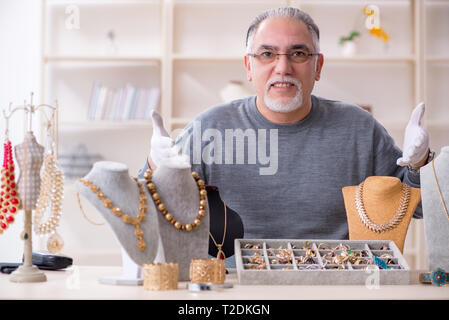 White Bearded Old Jeweler At Workshop Stock Photo - Alamy