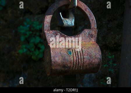Ancient rusted metal lock Stock Photo
