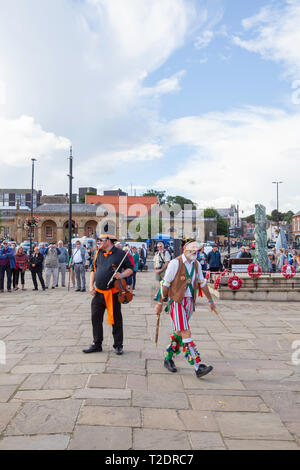 celebrations and dancing on the streets at Whitby Folk week 2018, North Yorkshire coast, England Stock Photo