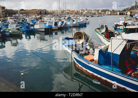 Favignana, Italy - September, 2018. Old colourful fishing boats in the harbour of Favignana, the largest of the Egadi Islands. Stock Photo