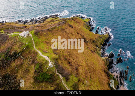 Chapel on a hill, next to the sea in Devon. Stock Photo