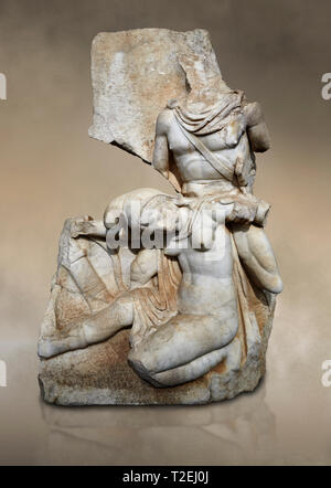 Roman Sebasteion relief sculpture of Nero conquering Armenia Aphrodisias Museum, Aphrodisias, Turkey.  Against an art background.  Nero, wearing only  Stock Photo