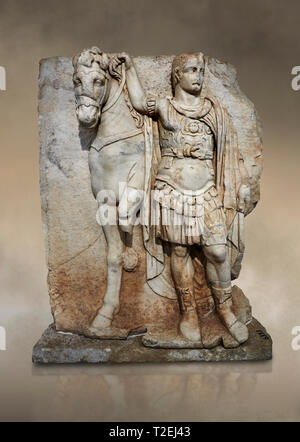 Roman Sebasteion relief sculpture of  an Imperial prince as Diokouros, Aphrodisias Museum, Aphrodisias, Turkey.  Against an art background.  An imperi Stock Photo