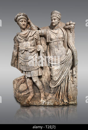 Roman Sebasteion relief  sculpture of Nero being crowned emperor by Agrippina, Aphrodisias Museum, Aphrodisias, Turkey.   Agrippina crowns her young s Stock Photo