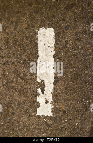 Detail of Crumbling White Painted Number One On Rough Concrete Ground Stock Photo