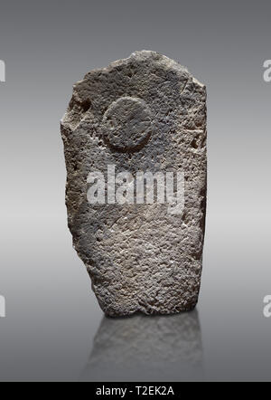 Late European Neolithic prehistoric Menhir standing stone with carvings on its face side.  Menhir Museum, Museo della Statuaria Prehistorica in Sardeg Stock Photo