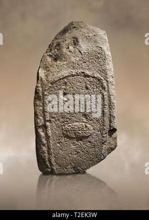 Late European Neolithic prehistoric Menhir standing stone with carvings on its face side. Excavated from Amassed VII, Allai.  Menhir Museum, Museo del Stock Photo