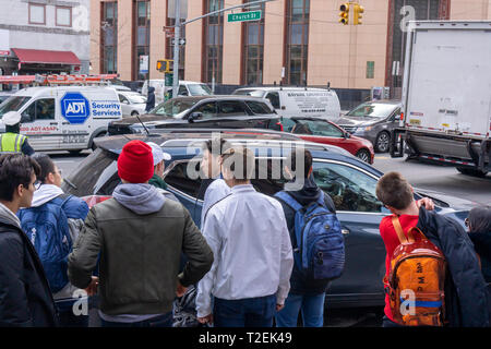 Perdestrians wait to cross traffic clogged Canal Street in New York on Wednesday, March 27, 2019. Legislators in Albany are finalizing plans for instituting congestion pricing in New York City. (Â© Richard B. Levine) Stock Photo