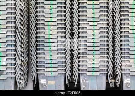Plastic containers are stacked perfectly together to wait for the packaging in next time Stock Photo