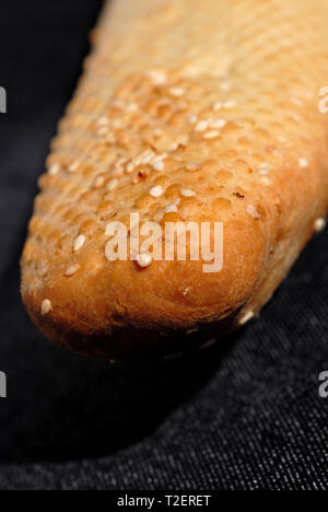 French baguette freshly baked closeup. Shallow depth of field Stock Photo