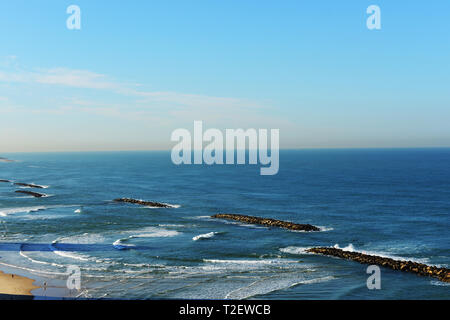 The wave breakers at the sea in Tel-Aviv. Stock Photo