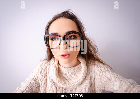 Funny nerd girl working on computer Stock Photo