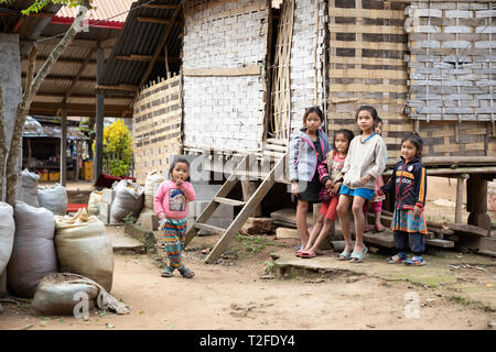 Local children in the village of Done Khoun on the 100 waterfalls walk, near Nong Khiaw, Muang Ngoi District, Luang Prabang Province, Northern Laos, L Stock Photo