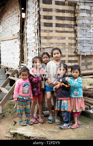 Local children in the village of Done Khoun on the 100 waterfalls walk, near Nong Khiaw, Muang Ngoi District, Luang Prabang Province, Northern Laos, L Stock Photo