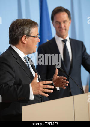 02 April 2019, Luxemburg: Armin Laschet (CDU, l), Prime Minister of North Rhine-Westphalia, and Mark Rutte, Prime Minister of the Netherlands, will hold a joint press conference. The Benelux states and North Rhine-Westphalia want to intensify their cooperation. Photo: Bernd Thissen/dpa Stock Photo