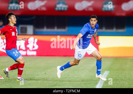 Zhengzhou, China. 31st Mar, 2019. Colombian football player Giovanni Moreno of Shanghai Greenland Shenhua celebrates after scoring against Henan Jianye in their 3rd round match during the 2019 Chinese Football Association Super League (CSL) in Zhengzhou city, central China's Henan province, 31 March 2019. Shanghai Greenland Shenhua defeated Henan Jianye 2-1. Credit: Matt Buxton/Alamy Live News