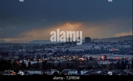 Glasgow, Scotland, UK, 2nd April, 2019, UK Weather: Stormy weather clouds heading over the west of the city and clydebank with the kilpatrick hills and the erskine bridge. Credit Gerard Ferry/Alamy Live News Stock Photo