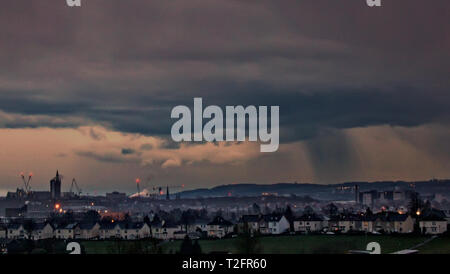 Glasgow, Scotland, UK, 2nd April, 2019, UK Weather: Stormy weather clouds heading over the west end with the Glasgow university clock tower and the Cathkin brae hills to the east of the city where the storm is coming from. Credit Gerard Ferry/Alamy Live News Stock Photo