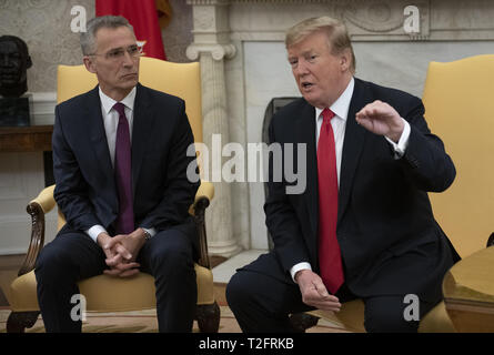 Washington, District of Columbia, USA. 2nd Apr, 2019. United States President Donald J. Trump meets Jens Stoltenberg, Secretary General of the North Atlantic Treaty Organization (NATO) in the Oval Office of the White House in Washington, DC on Tuesday, April 2, 2019 Credit: Ron Sachs/CNP/ZUMA Wire/Alamy Live News Stock Photo