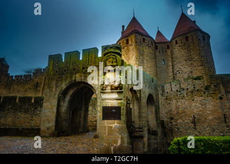 The entrance of the drawbridge in Cite Carcassonne with lady Carcas's bust, Carcassonne France Stock Photo