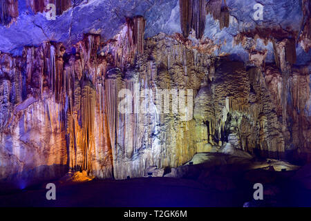 Amazing geological forms in Paradise Cave near Phong Nha, Vietnam. Limestone cave full of stalactites and stalagmites. Stock Photo