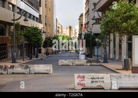 BEIRUT, LEBANON - 23 APR 2017: roadblocks and lift gates form a military chicane on Rue du Parlement, a central street in downtown Beirut, Lebanon. Stock Photo