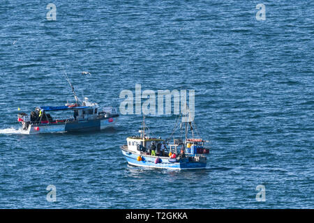 Fishing boats Loyal Partner PZ30 and SS 333 at sea off the coast of Newquay Cornwall. Stock Photo