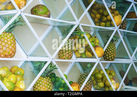 shelf full of fresh tropical fruits to make juice Stock Photo