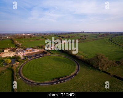 Aerial view of a horse training circle corral outdoors on the grass at an equestrian center Stock Photo