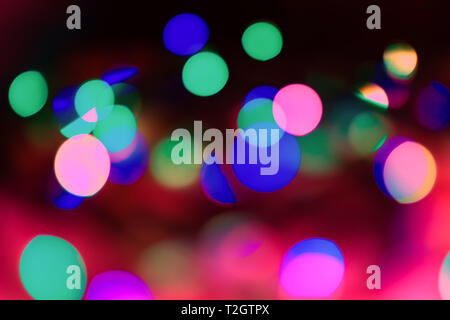 Abstract background of neon lights. The lights are out of focus Stock Photo
