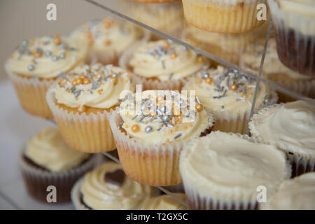 Cupcakes placed on a cake stand waiting to be eaten on a wedding day Stock Photo
